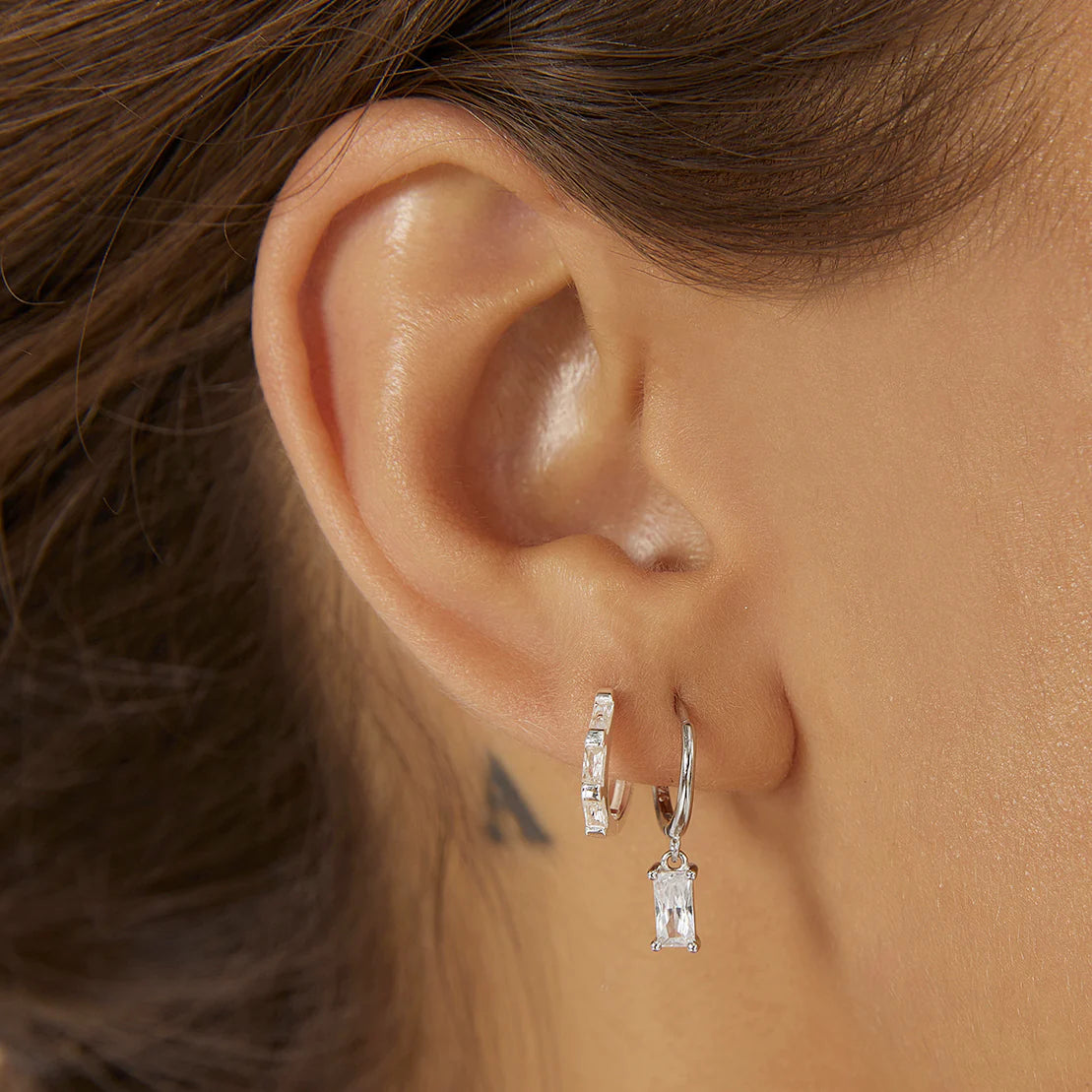 Elysian Collective Arms of Eve Holi Silver Huggie Earring