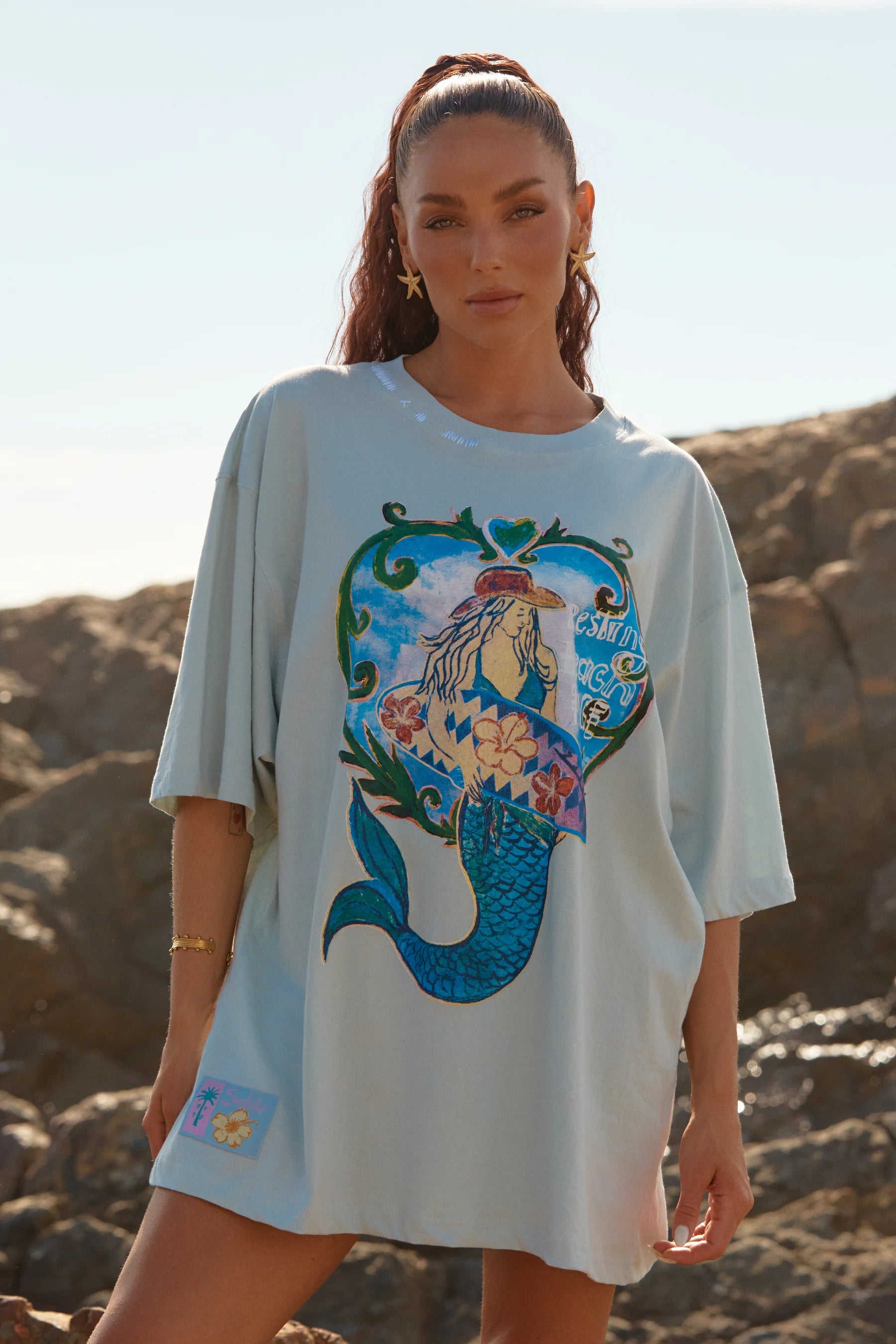 Elysian Collective Sabbi Resting Beach Face Tee Sky Blue