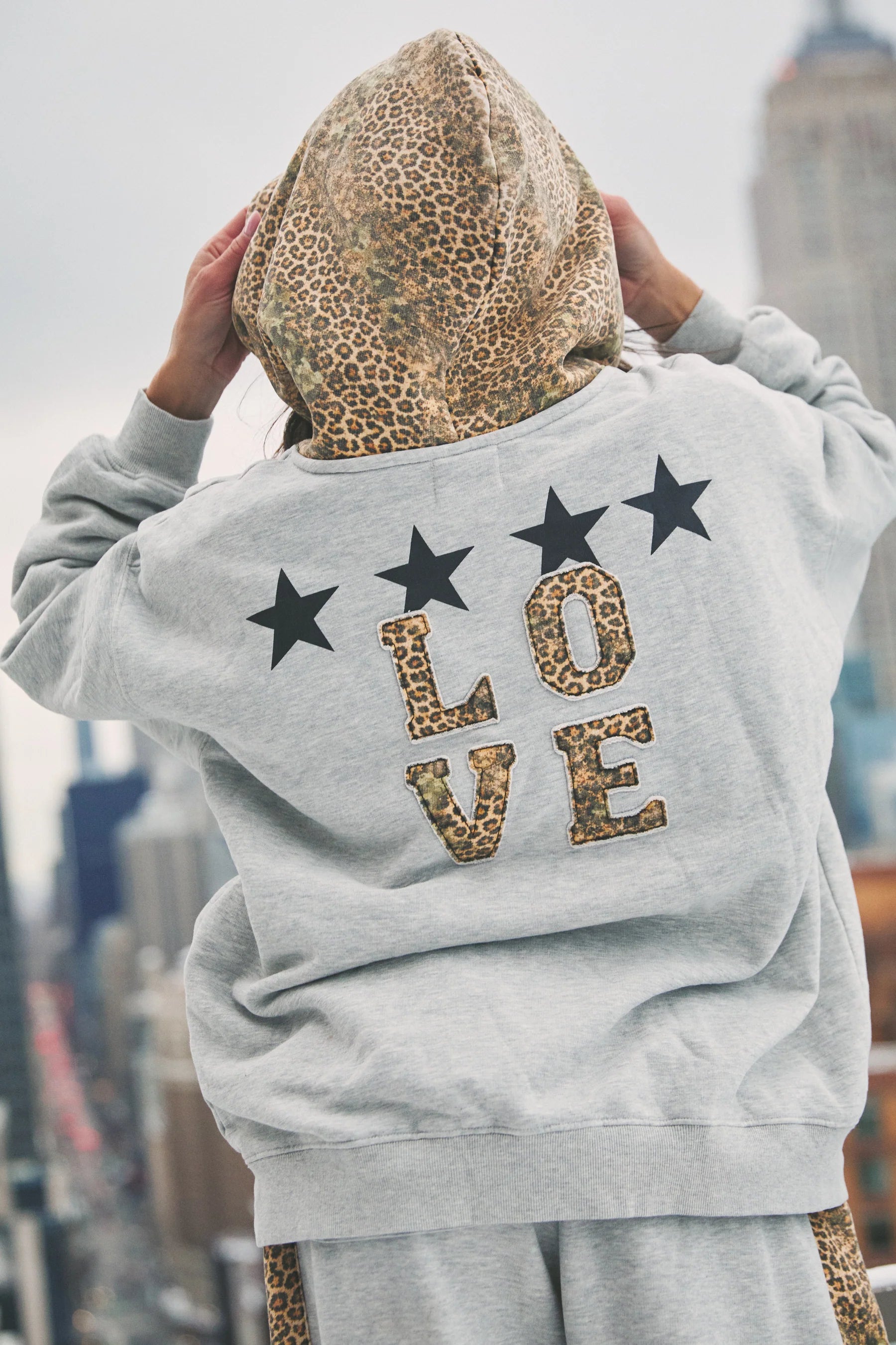 Elysian Collective Sabbi The Be Happy Leopard Hoodie