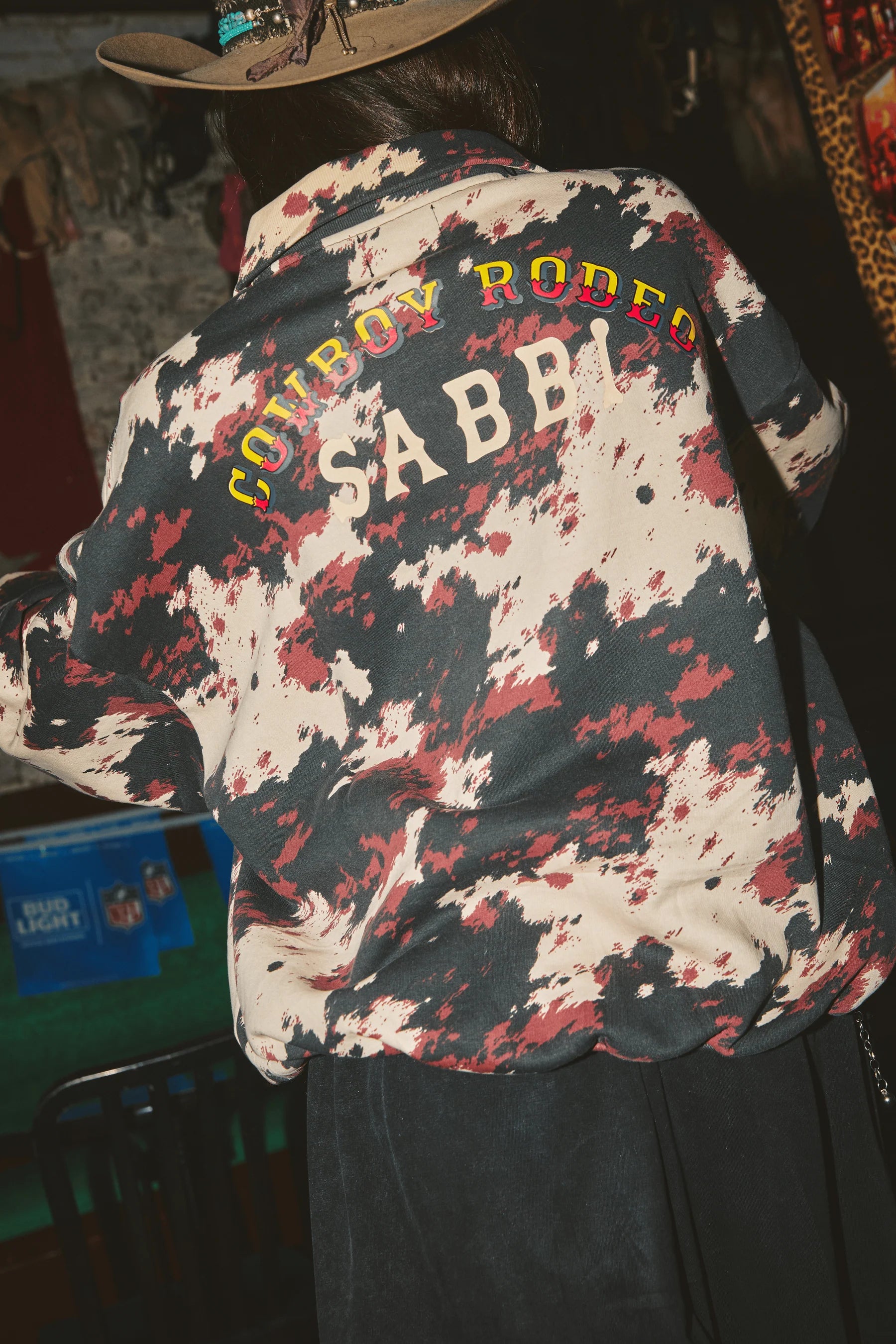 Elysian Collective Sabbi The Cow Print Collared Sweater