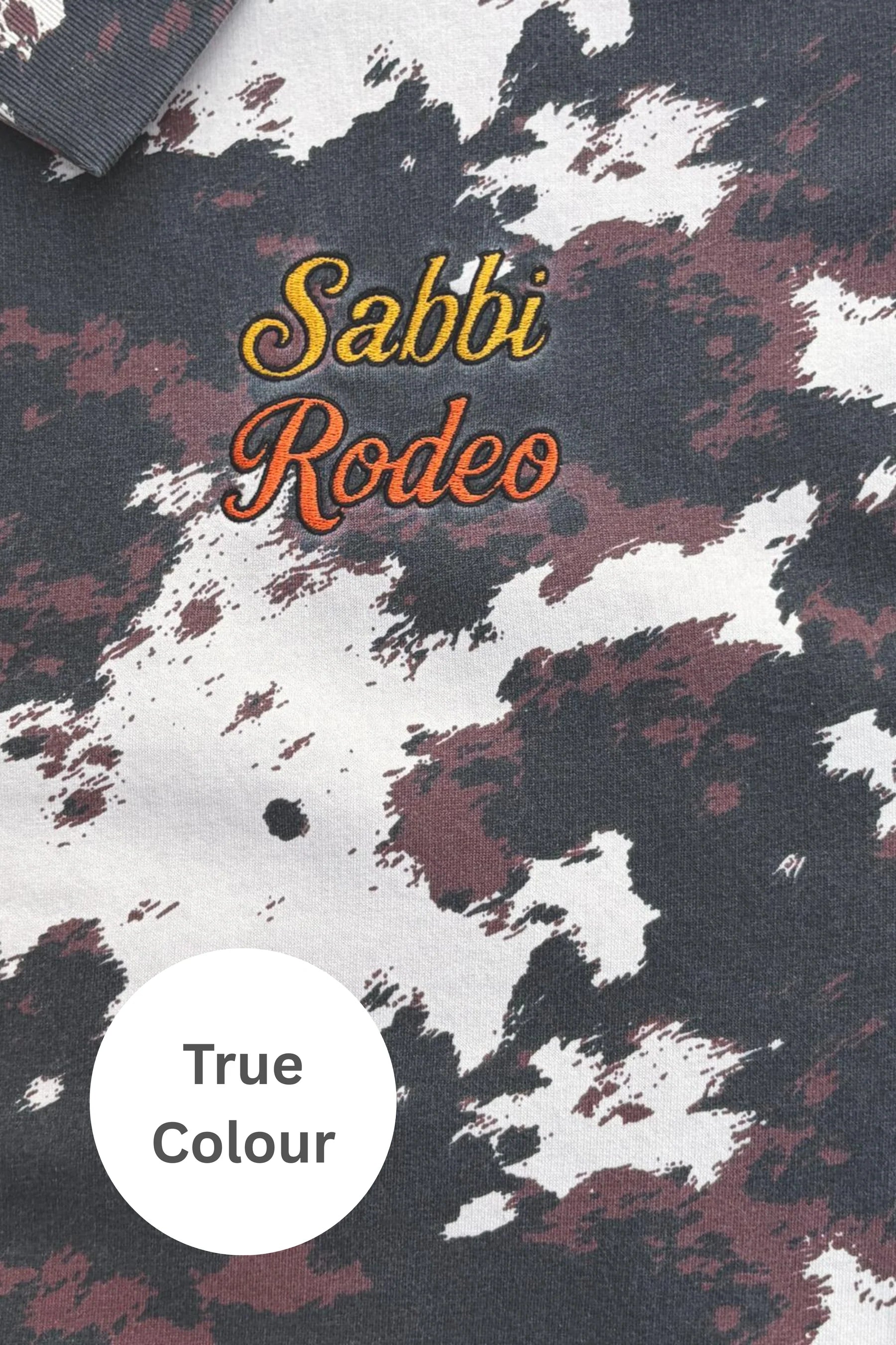 Elysian Collective Sabbi The Cow Print Collared Sweater