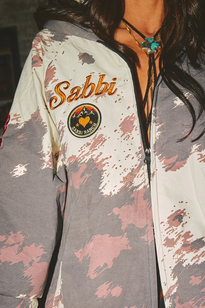 Elysian Collective Sabbi The Sabbi Ranch Bomber Jacket Cow Print